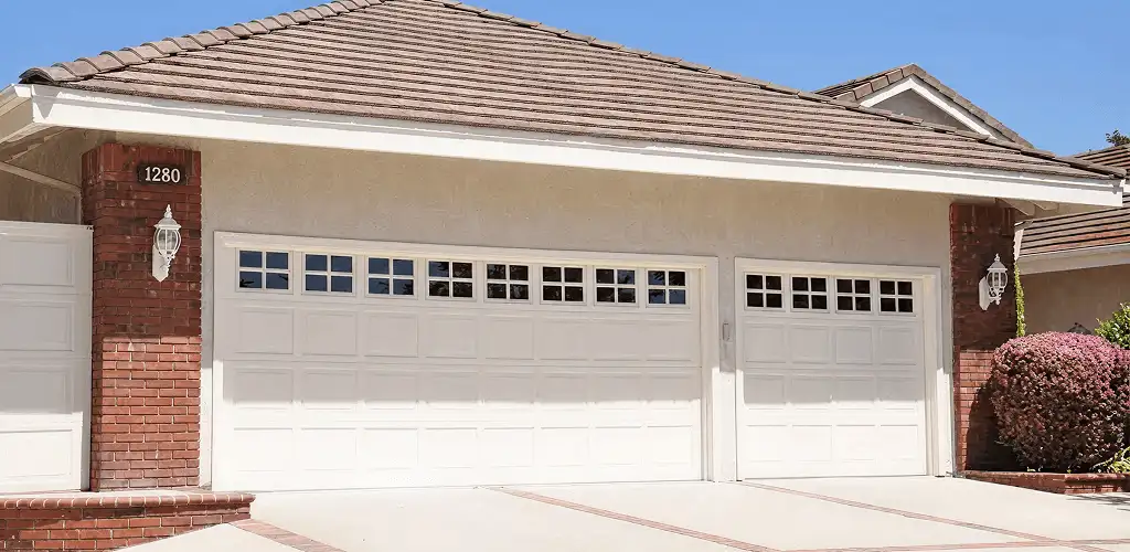 Residential garage door repair service for a double garage door in Sarasota, FL