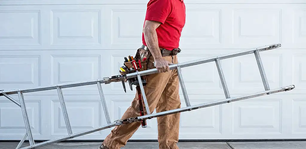Garage door repair technician arriving with tools and ladder in Sarasota, FL