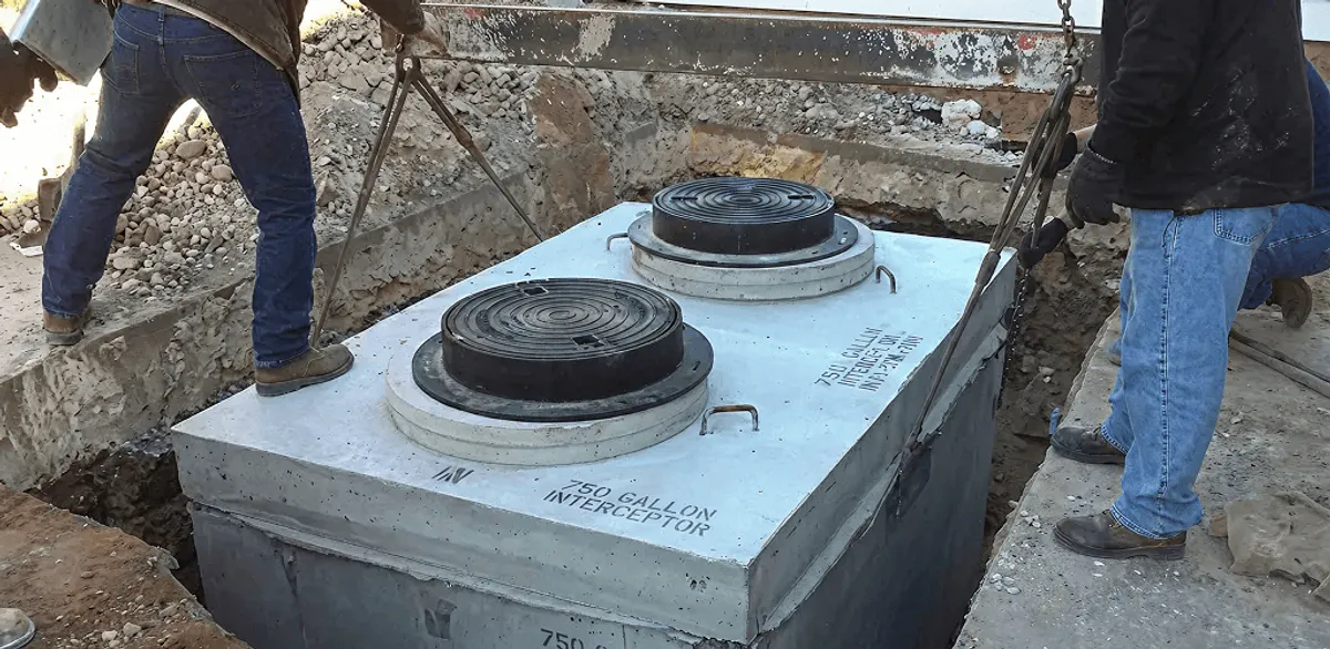Grease trap installation for a commercial property drainage system in Sarasota, FL