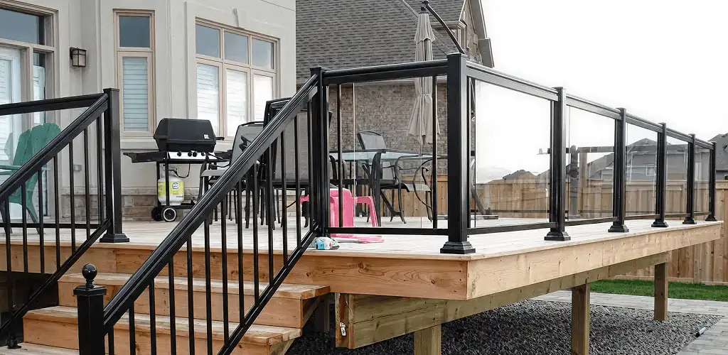 Handrail installation on a deck staircase for safety and code compliance in Sarasota, FL